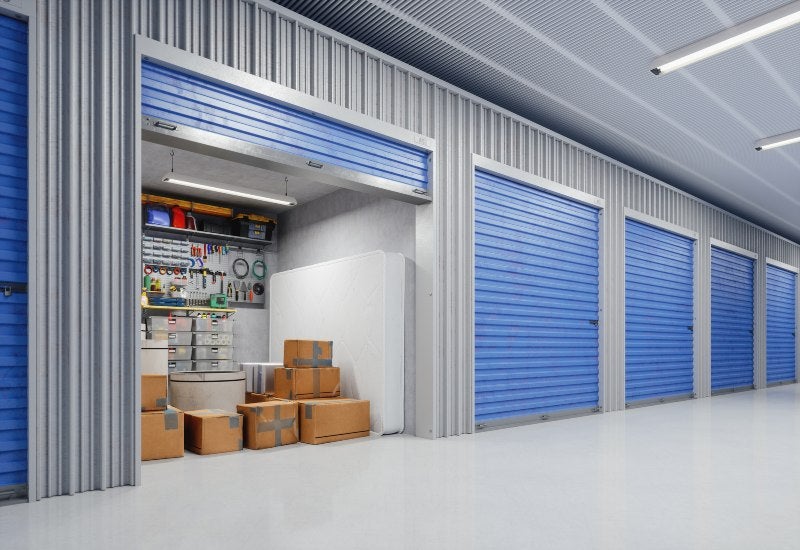 Blue-doored storage units in a secure warehouse setting in Mountain View, CA.