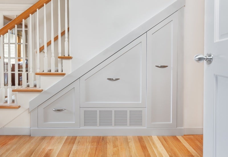 White stairway with built-in unit features efficient under-stairs self-storage in Mountain View, CA.