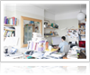 Man working in a cluttered office