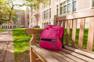 college campus pink backpack on a bench in Mountain View, CA