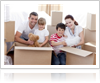 Family packing belongings in boxes