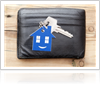 Key with home shaped keychain